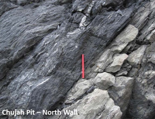 Sheared graphitic sedimentary rocks of the Kumasi basin in contact with altered mafic volcanic lenses