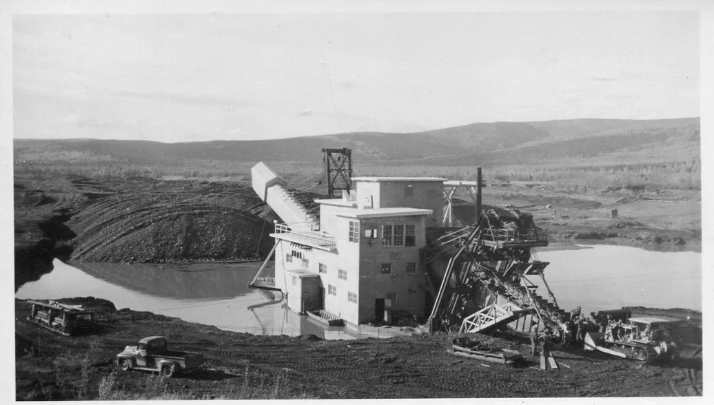 Dredge mining of placer gold