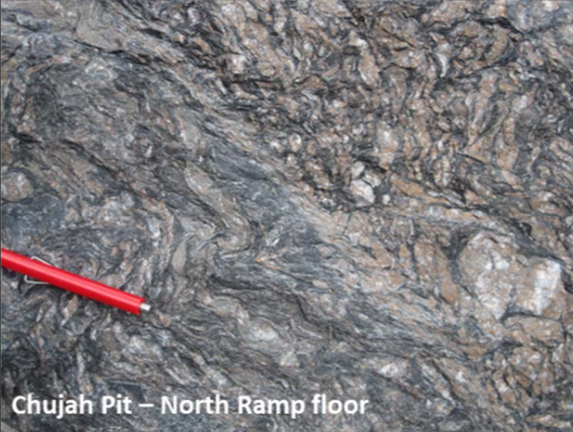 Mineralized graphitic shear zone characterized by quartz vein boudins and ankerite alteration